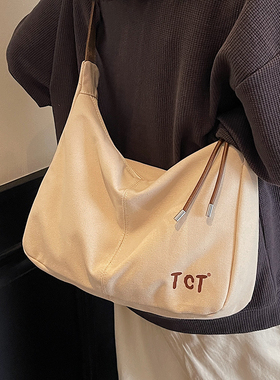 简约休闲帆布包包女式2026新款百搭大容量学生上课通勤单肩斜挎包