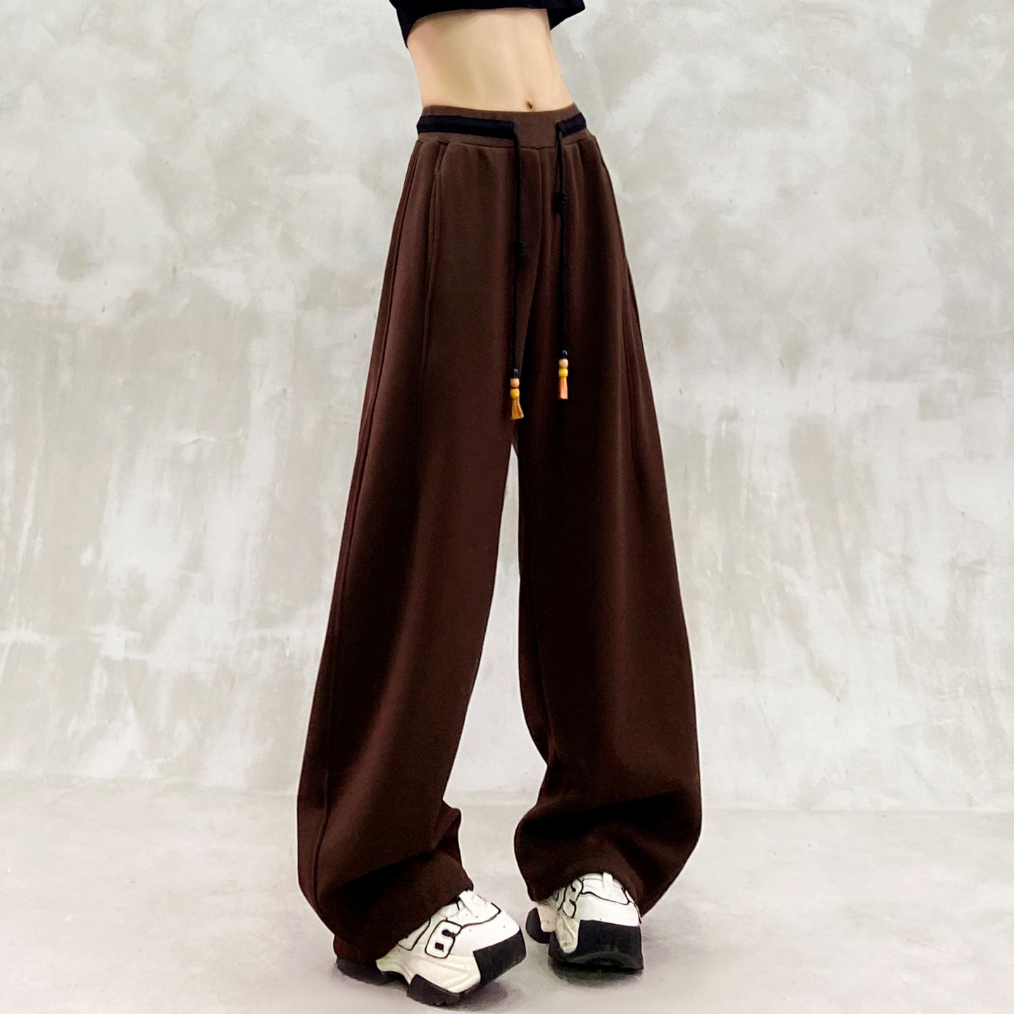 个性条纹拼接加绒休闲弯刀裤女