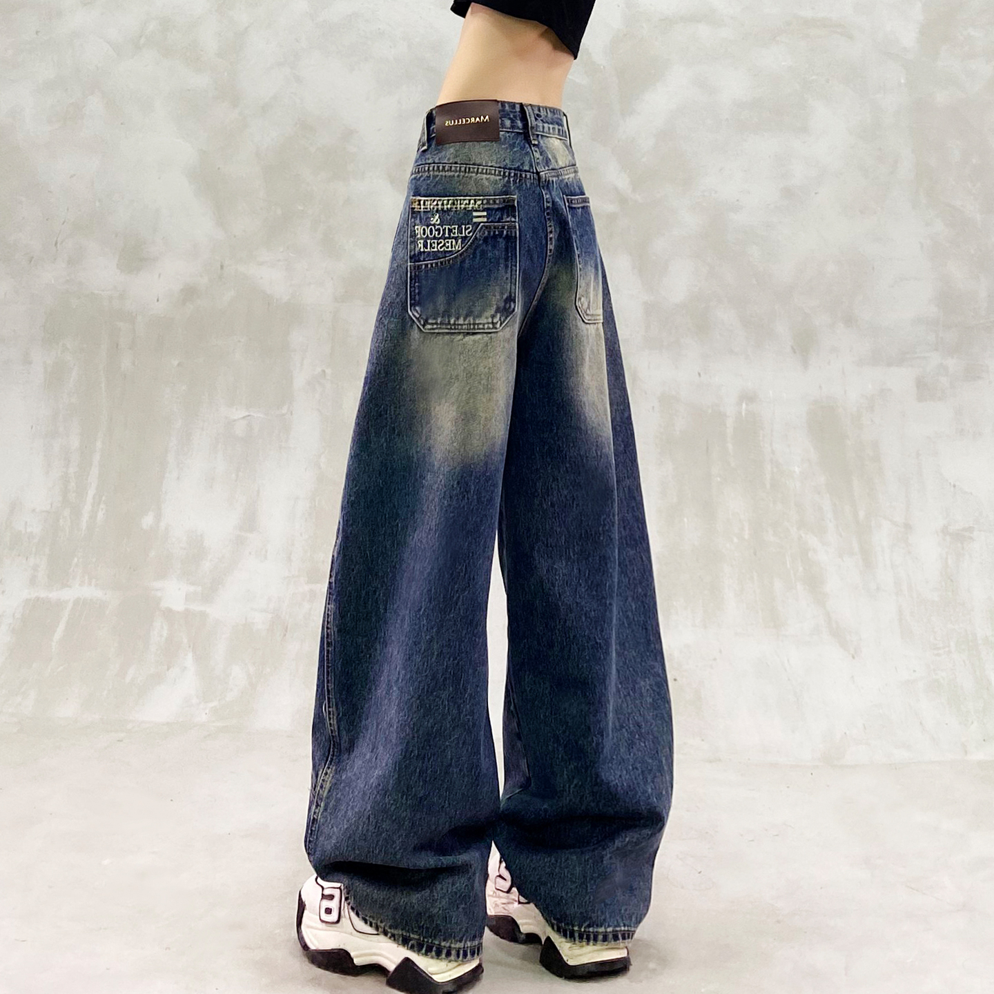 帅气拼接设计复古牛仔弯刀裤