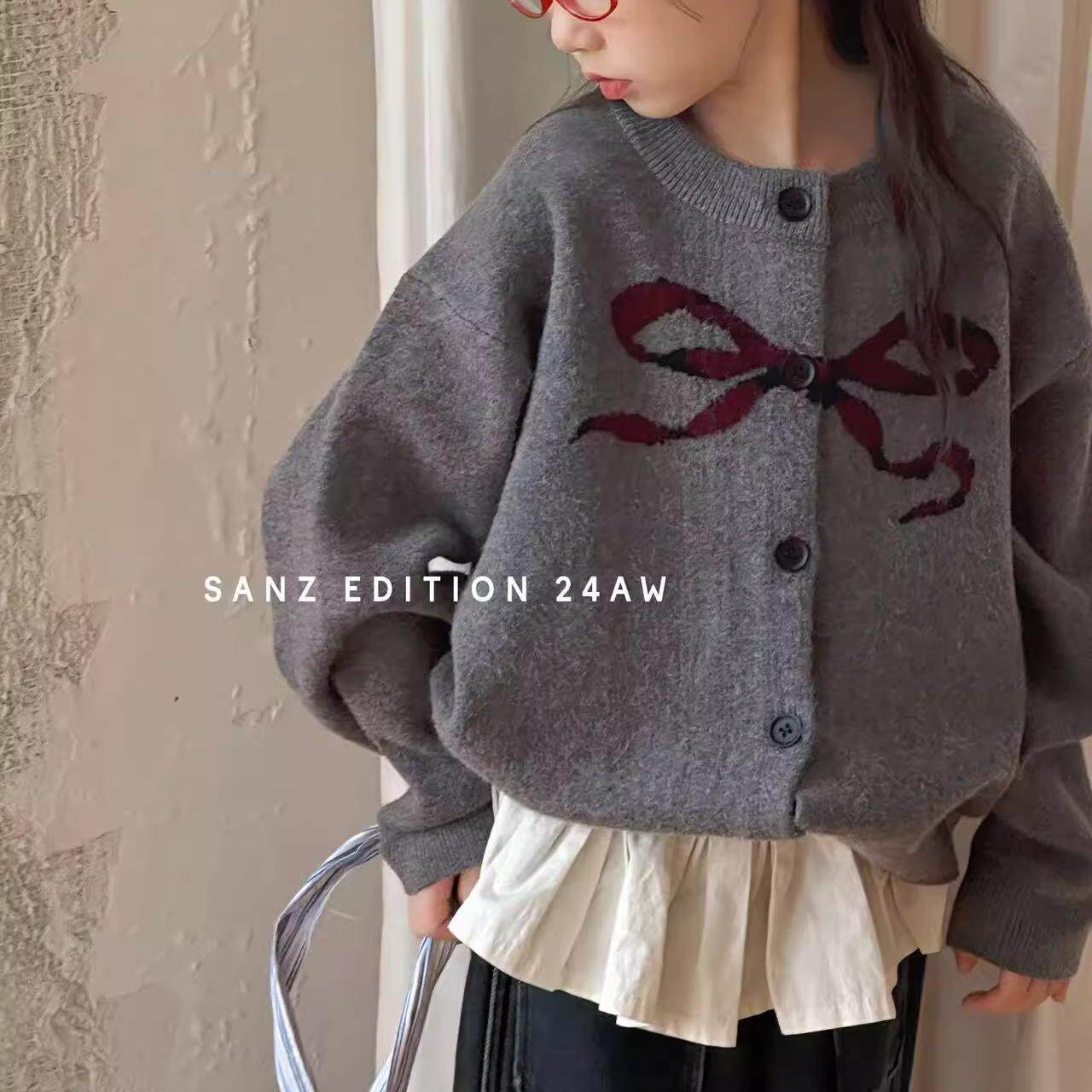 女童蝴蝶结圆领针织衫