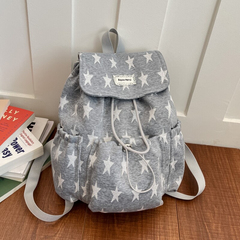 小众条纹帆布双肩包女2026新款旅游轻便背包休闲大学生通勤小书包