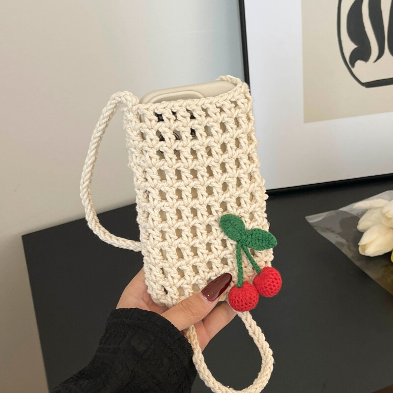 新款韩版手工编织手机斜挎包包流行ins镂空沙滩百搭单肩手提小包