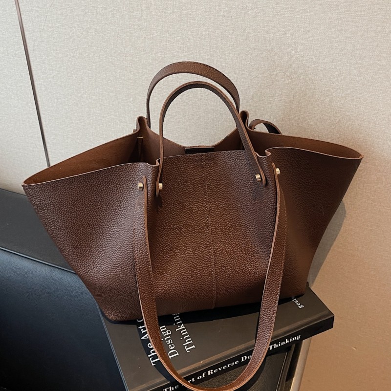 大容量托特包女2025简约百搭单肩手提包通勤大包小众翅膀包腋下包