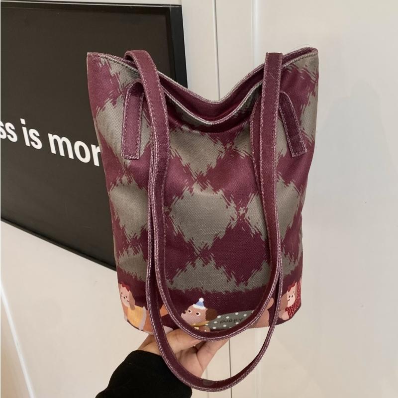 休闲百搭包包女2025新款格纹猫猫手提腋下水桶包单肩包可爱布包女