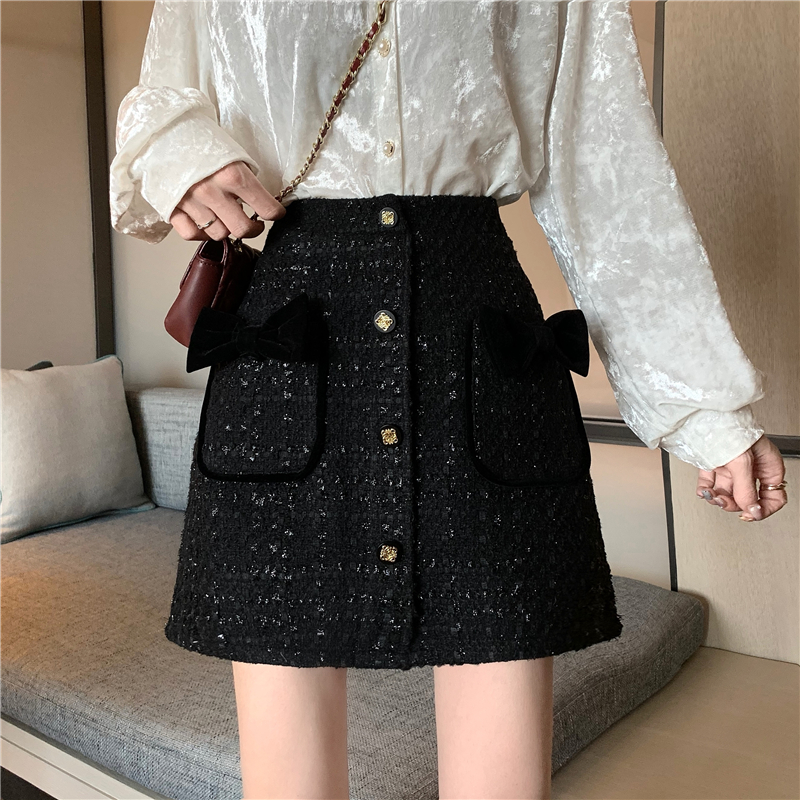 Real photo of xiaoxiangfeng fried Street bow heavy industry high waist buttock A-line skirt short skirt buttock skirt