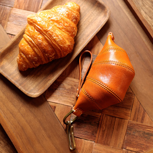 重工植鞣牛皮复古可颂牛角零钱包真皮便携文玩手串耳机口红收纳包