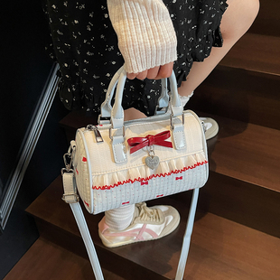 甜美蝴蝶结手提小包包女2026新款时尚蕾丝边枕头包夏季帆布斜挎包