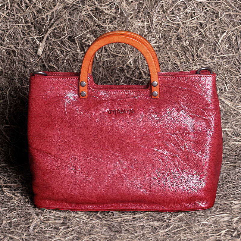 藏皮客包包女式2026春新款头层牛皮木质手柄隔层手提包真皮斜挎包