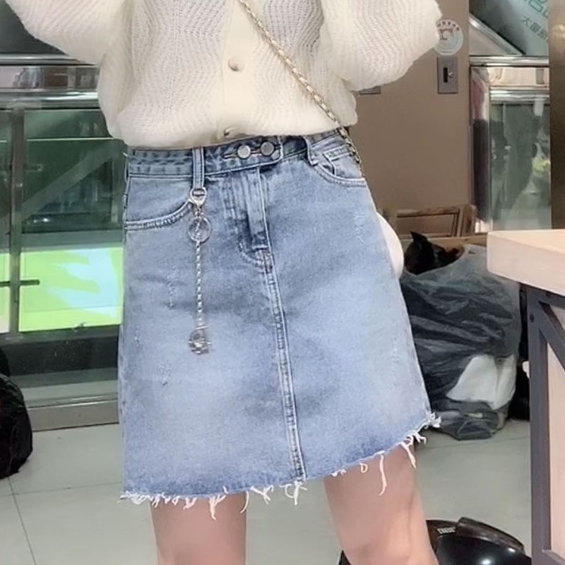 欧洲站2024春新款韩版磨破流苏牛仔半身裙女修身显痩包臀裙短裙