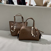 红蜻蜓2026新款 女包桶包女手提枕头包轻奢高级感斜挎包9621A0621M