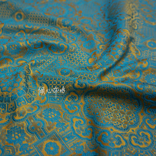 特桔金黄色底天蓝色团云锦织锦缎