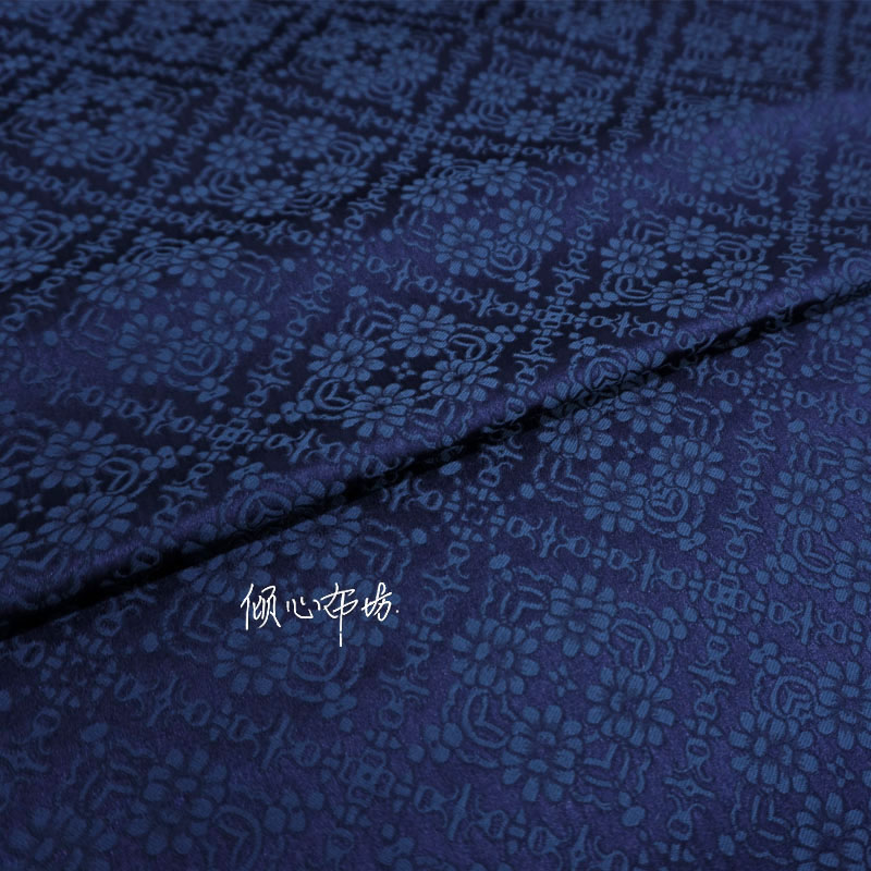 深蓝纯色暗花菱形天华缎子布料