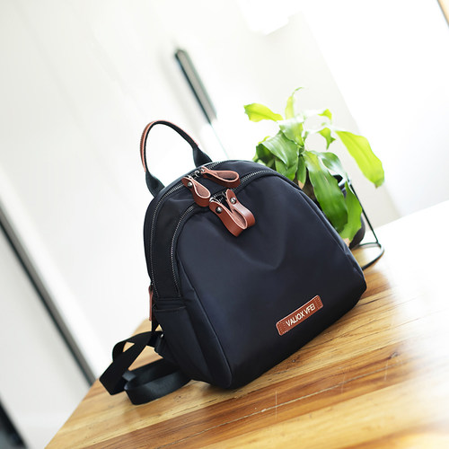 双肩包牛皮牛津布大容量轻便包包