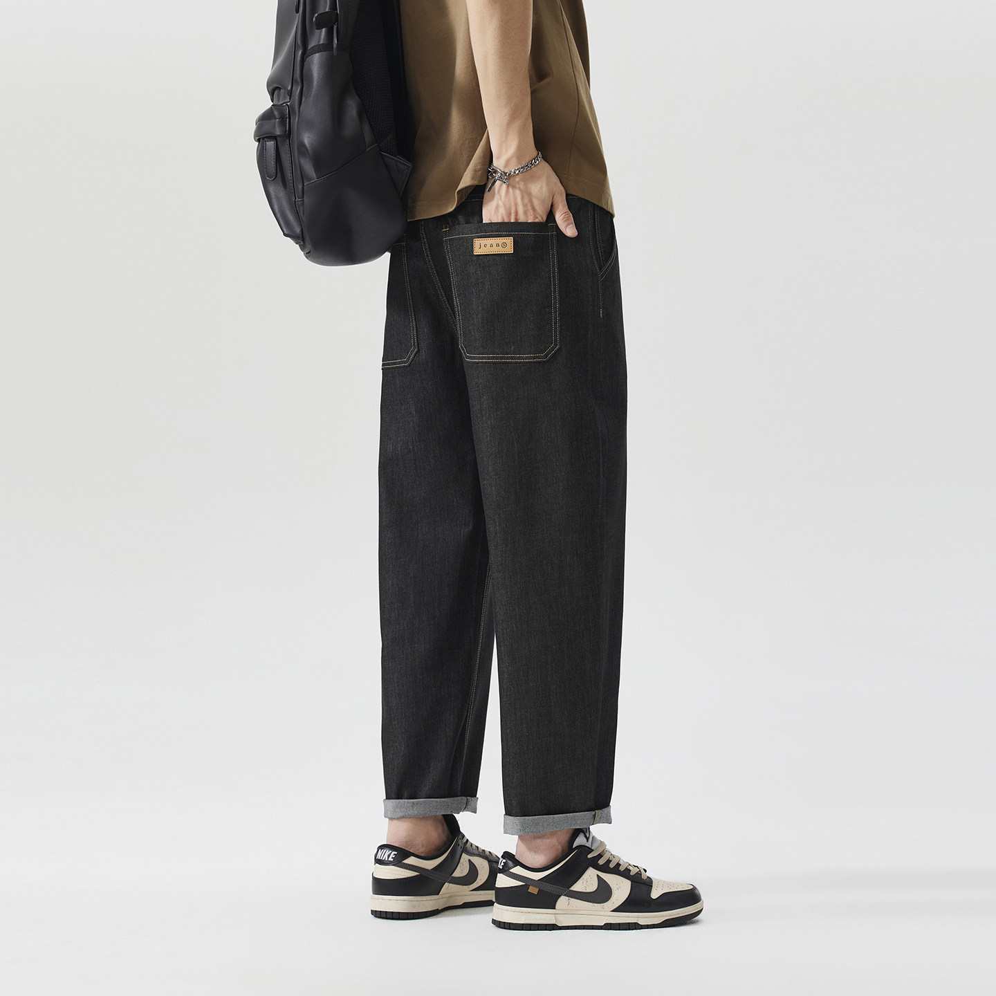 亚麻天丝防褪色面料男士凉感牛仔裤新款宽松弹力松紧腰锥形九分裤