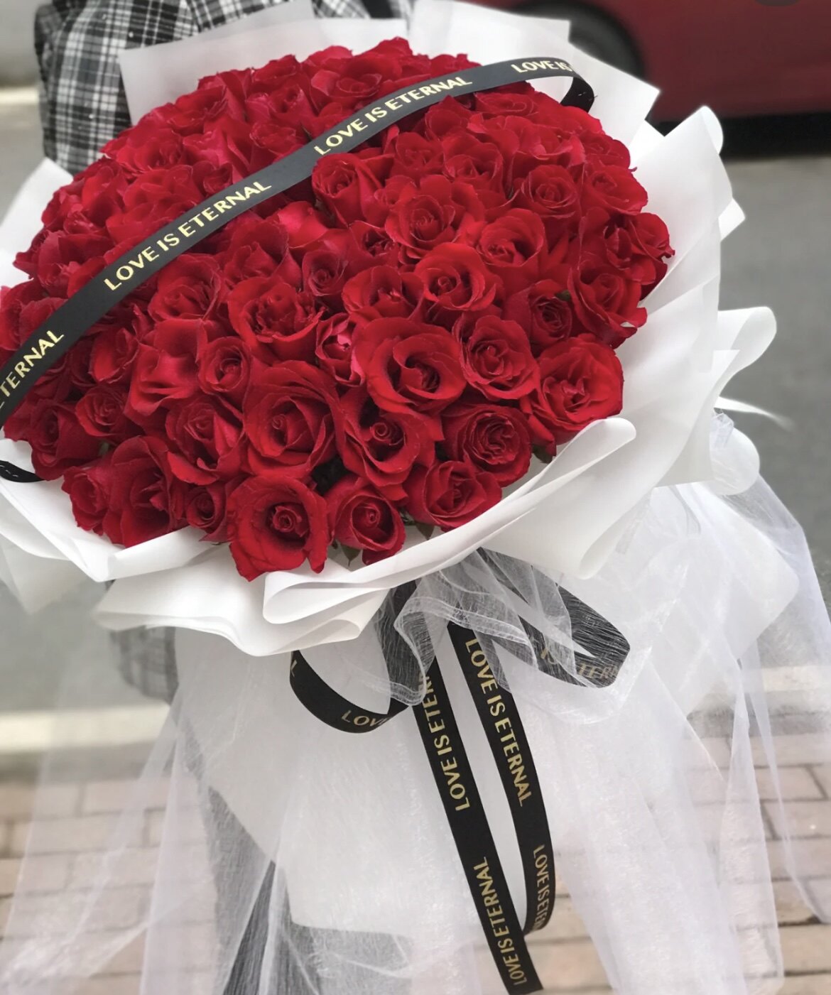 长春实体鲜花店99朵红玫瑰同城速递配送生日节日祝福送花上门