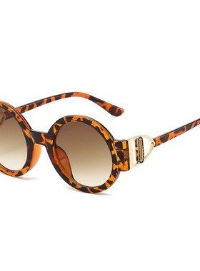 三角镜腿椭圆形女绿色太阳镜风