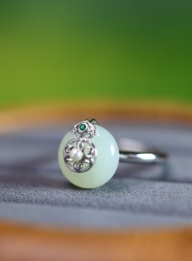 S925银镶嵌和田玉平安扣配彩锆戒指