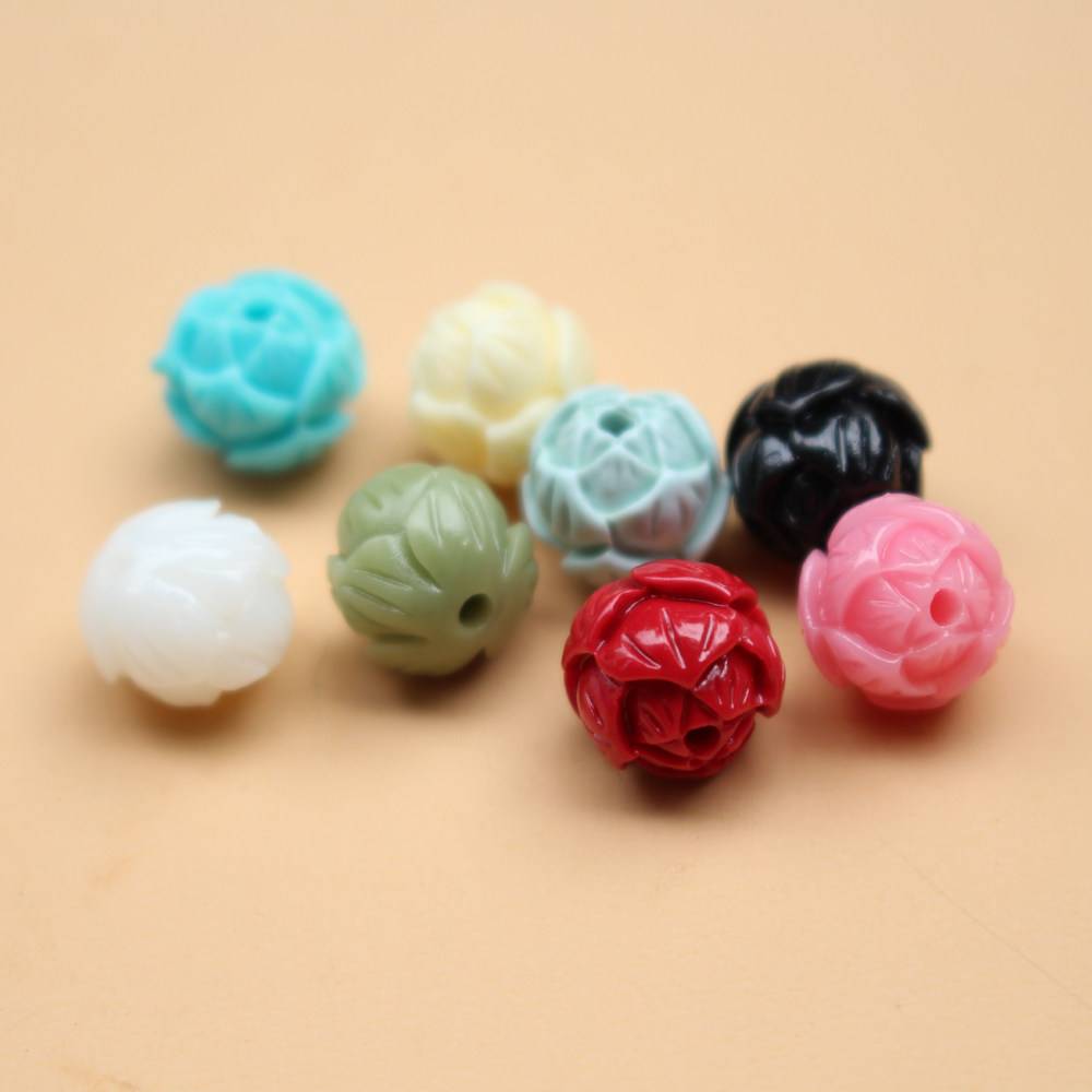珺菡合成珊瑚石粉蓝色莲花珠图片