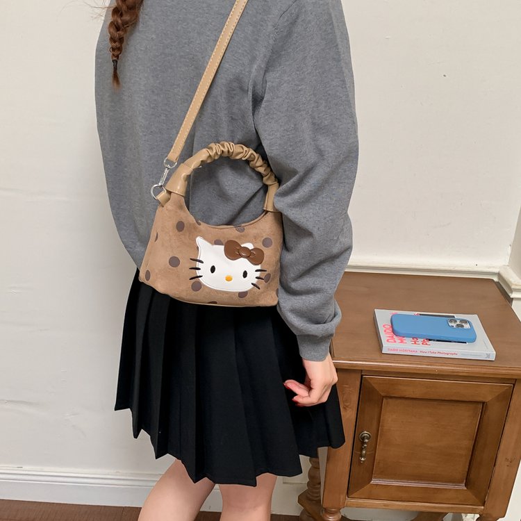 蝴蝶结迷你手提零钱包儿童波点猫咪斜挎包小女孩幼儿园宝宝单肩包