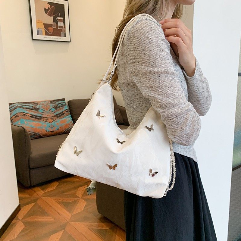 银色托特包女大容量2024新款休闲单肩包今年流行大学生上课通勤包,箱包皮具/热销女包/男包,托特包,淘宝优惠券,粉丝福利购,淘宝优惠卷