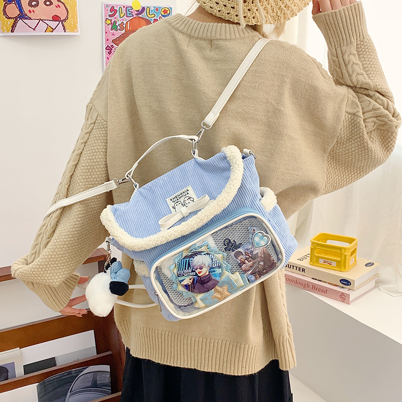 卡通可爱大容量浅蓝痛包