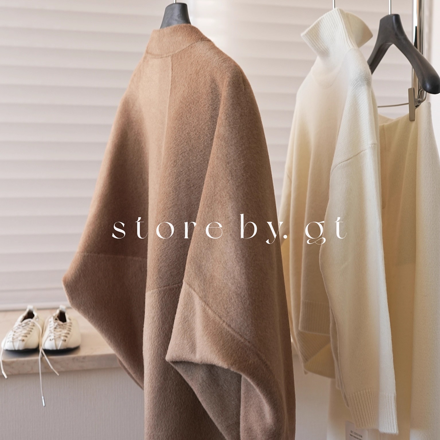 100%骆驼绒立裁无扣廓形中长大衣