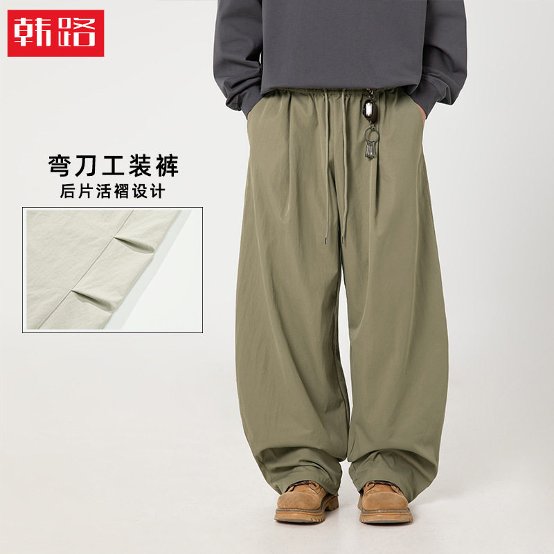 打褶设计弯刀休闲裤男2026秋季款长裤复古宽松潮牌微收脚抽绳裤子