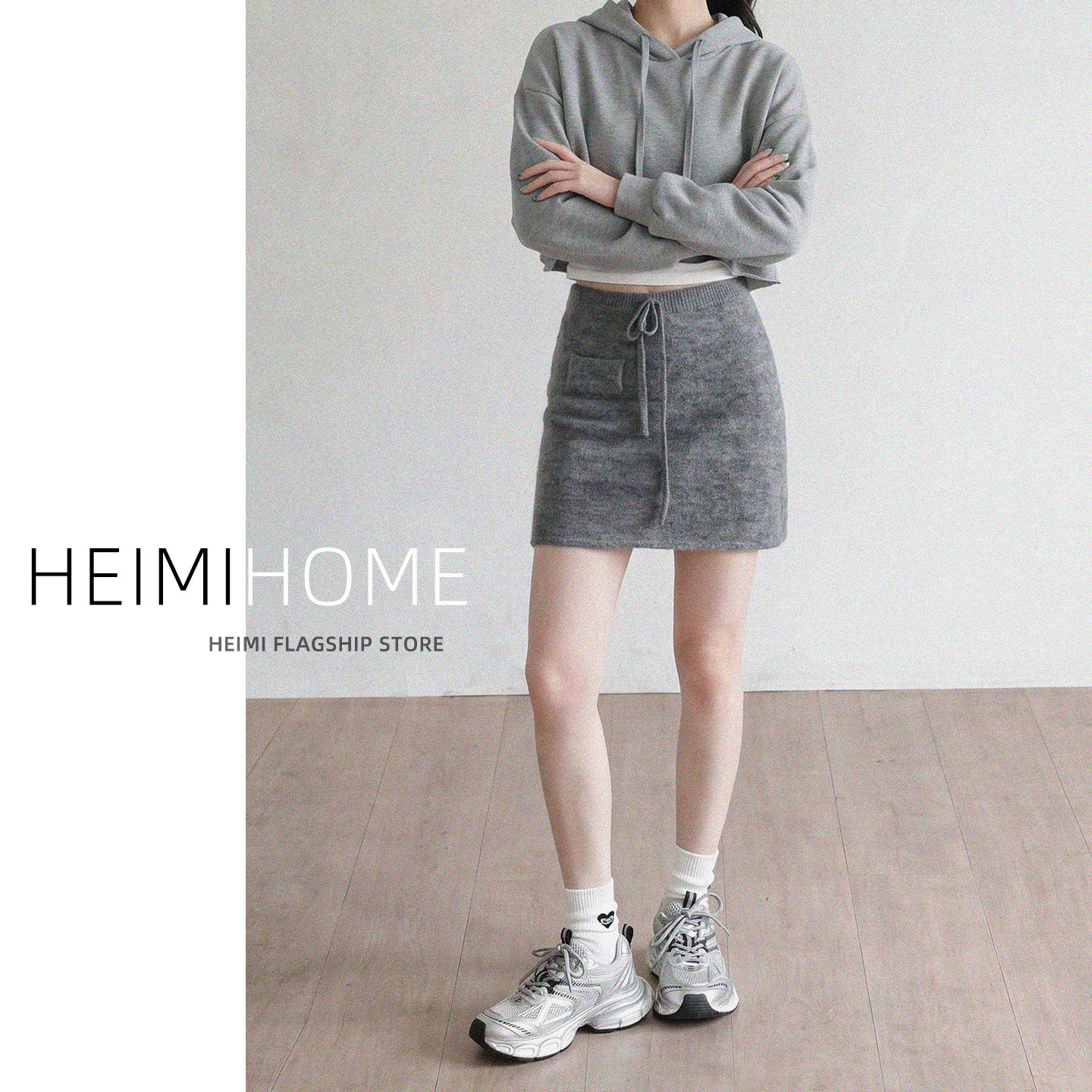 灰色慵懒松弛感针织短裙秋冬高腰假口袋包臀裙简约百搭a字半身裙