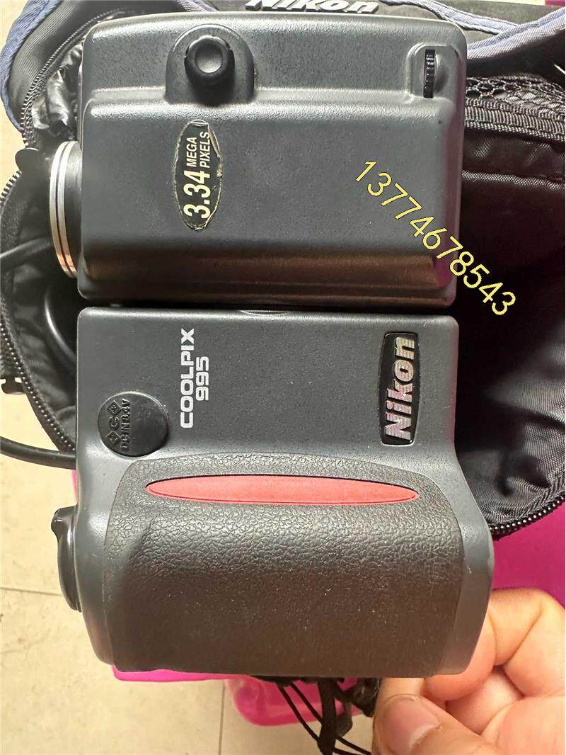 Nikon/尼康E995摇头数码摇头相机，配件齐全，功能正常议价属于什么档次？