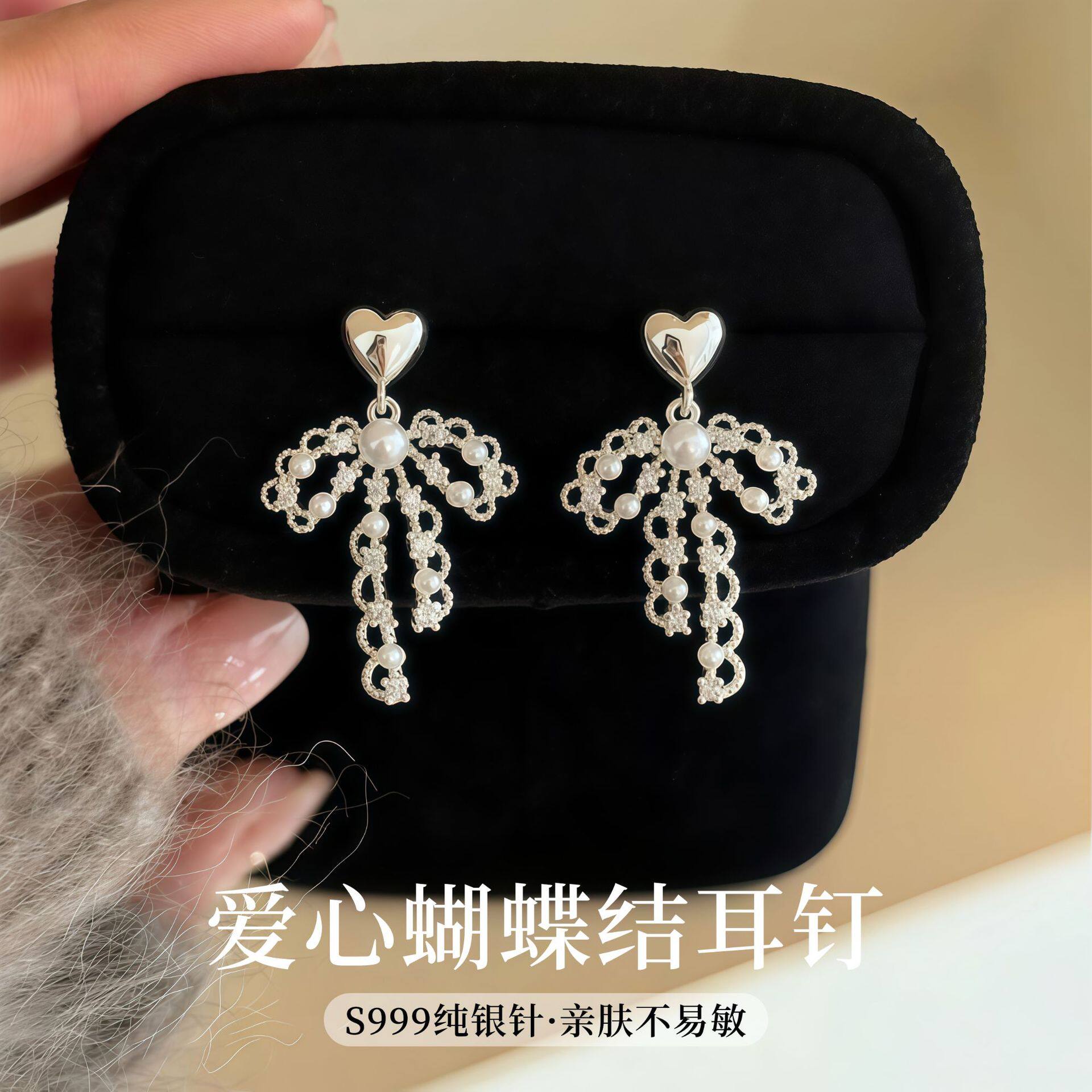S999纯银针爱心蝴蝶结耳钉女甜美气质小众高级感2026新款耳饰品