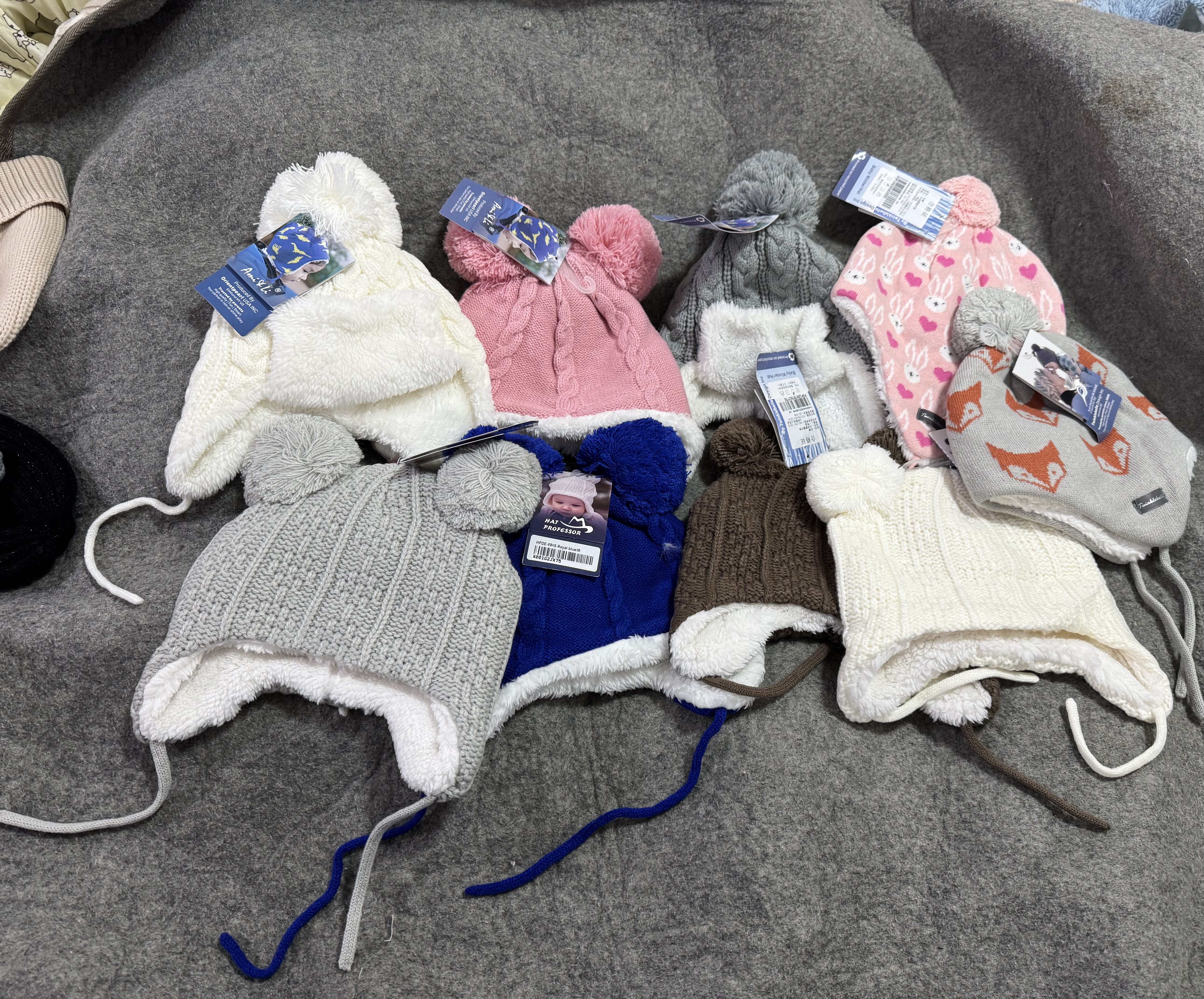 外贸原单秋冬宝宝加厚加绒保暖护耳帽针织毛线球帽子