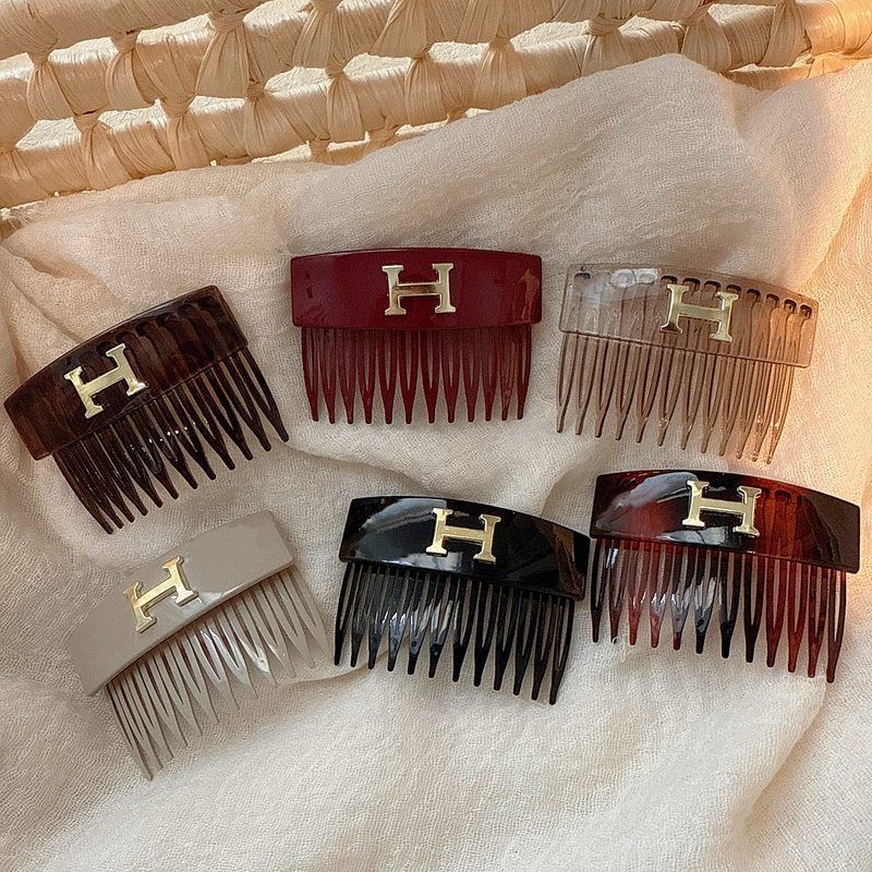 气质百搭字母小号防滑发梳时尚