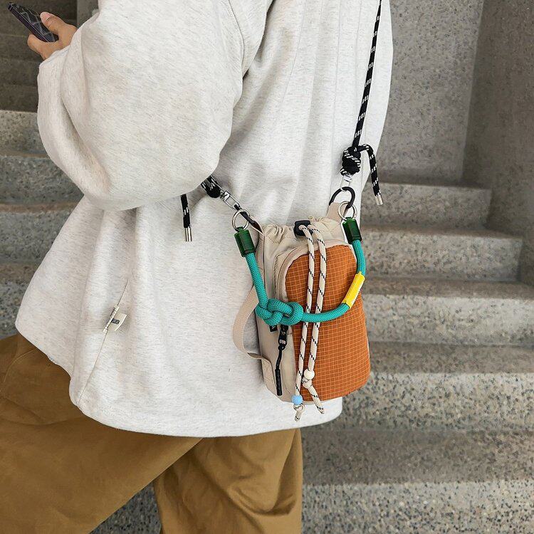 斜挎包轻便简约登山小包轻便手拎包短途旅行拼色手机包水杯包