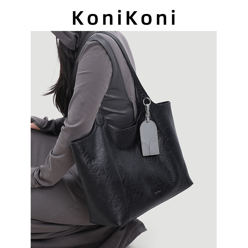 KoniKoni真皮黑色大容量托特包女2026新款轻便上班通勤包单肩大包