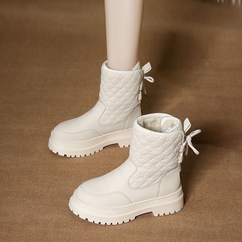 东北雪地靴女皮毛一体防滑中筒靴子女冬厚底加绒短靴防寒雪地棉鞋