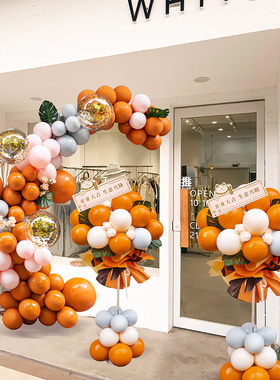 开放花篮橙色气球柱装饰商场门店入口五一劳动节活动氛围现场布置