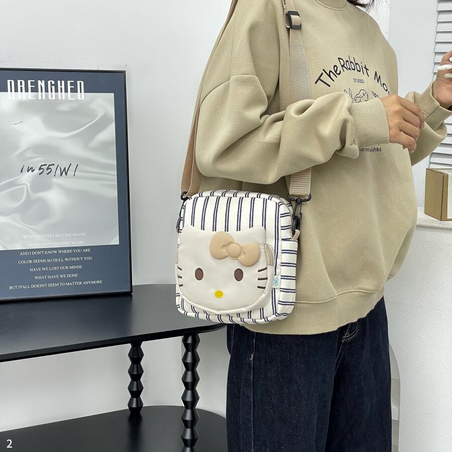 沐里沐气新款卡通kitty小学生KT斜挎包单肩儿童可爱猫咪手机小包