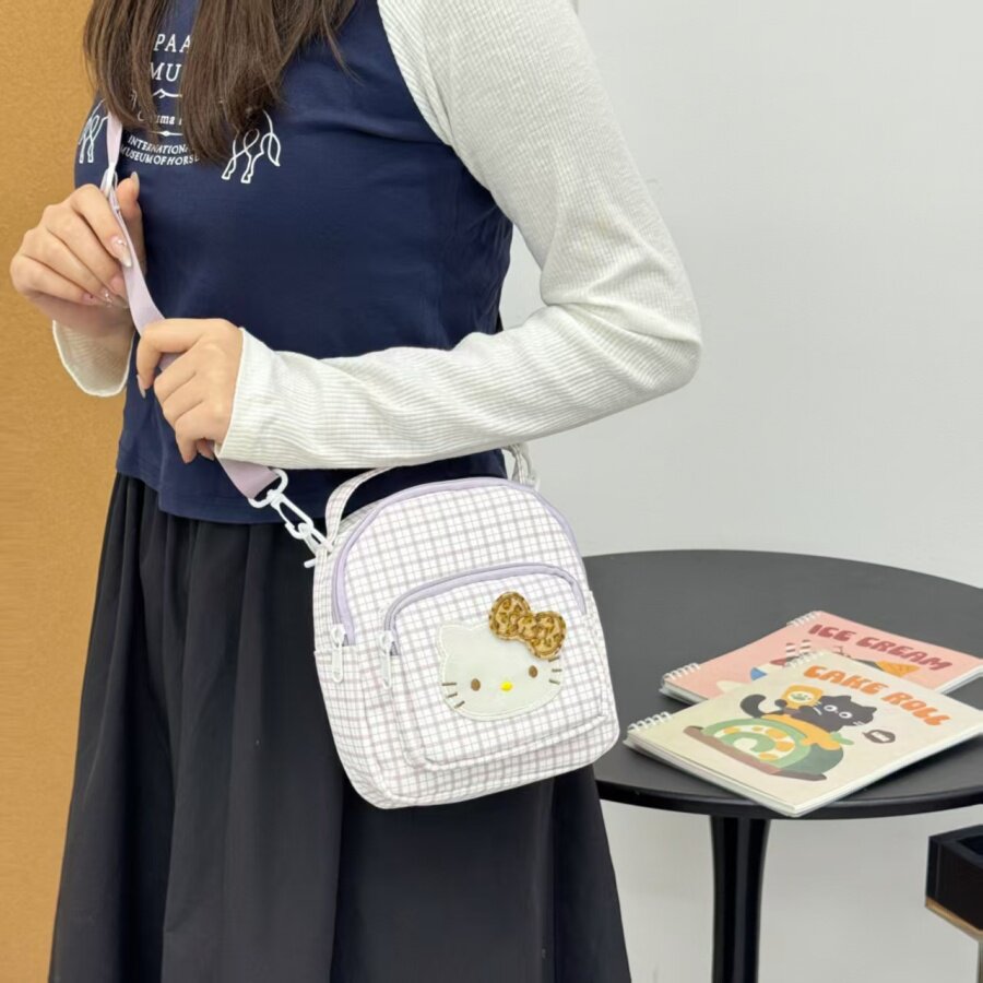沐里沐气可爱新款卡通KT斜挎包女孩时尚格纹儿童手机包学生单肩包