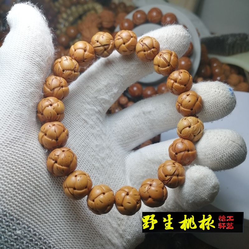 脑纹桃核打磨雕刻正圆绣球路路通手串时来运转手链毛线团手持