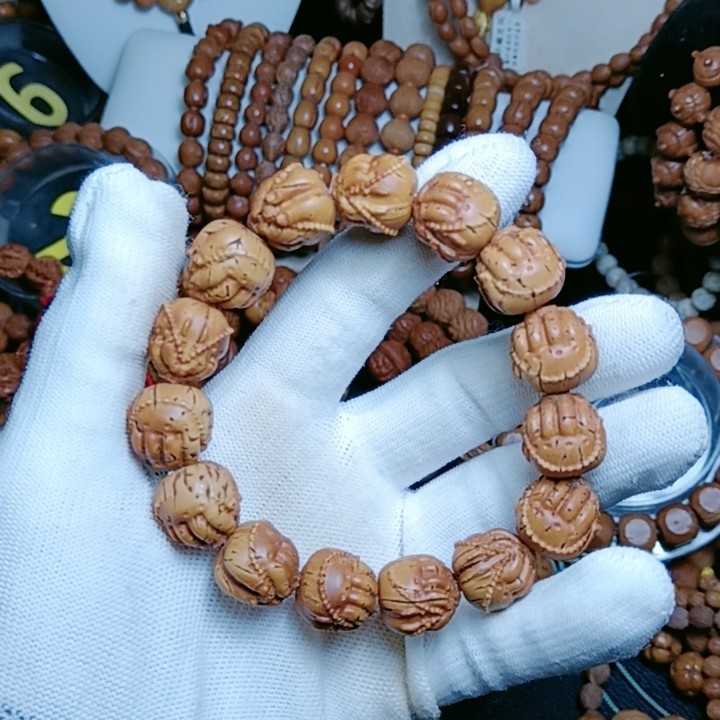 脑纹桃核雕刻佛手手串