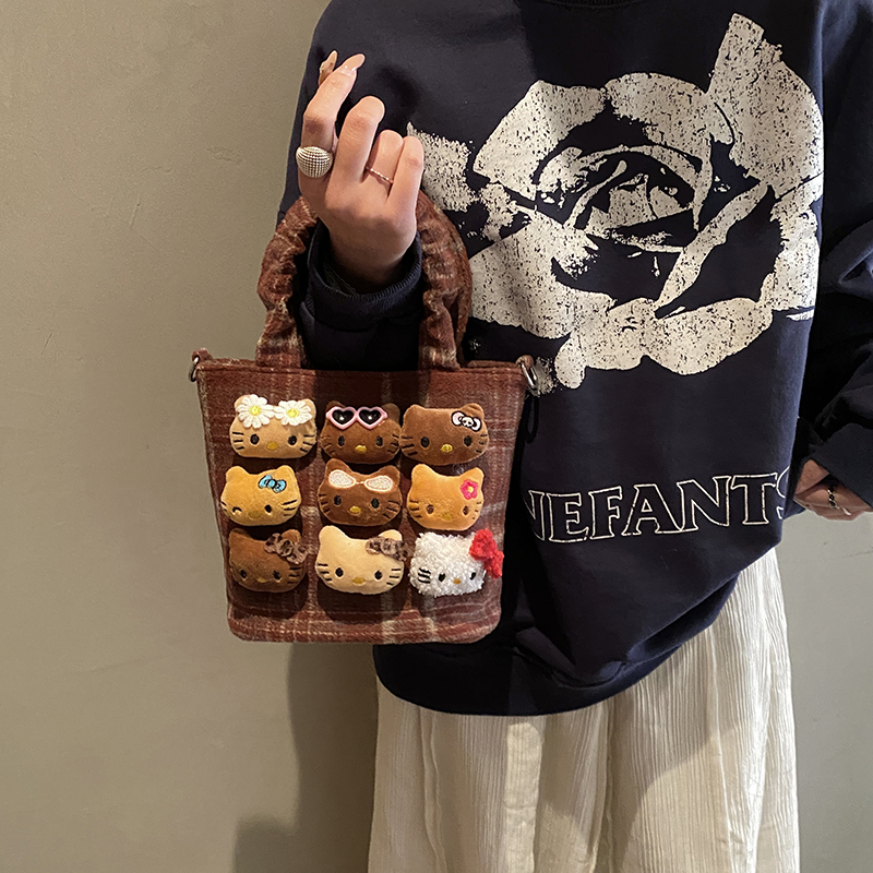 2026新款可爱公仔手拎包女