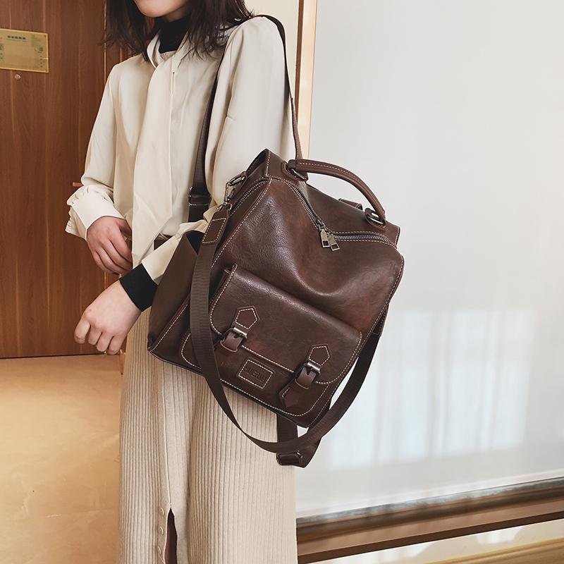 多功能复古英伦风大学生上课书包2025新款双肩包通勤旅行防水背包