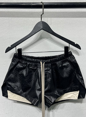 夏季暗黑R风格O白色口袋外露松紧带压纹皮面开衩女士修身休闲短裤