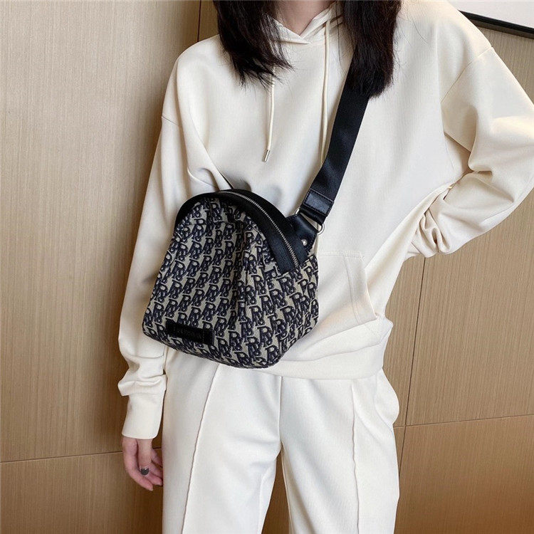 法国轻奢品牌Caring Koko~潮流帆布配真皮贝壳包单肩斜挎包乌龟包