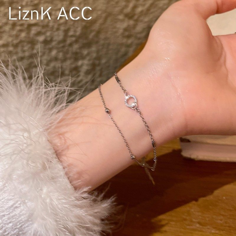 爱心流苏手链手链2025新款可调节轻奢小众双层叠戴手饰简约冷淡风