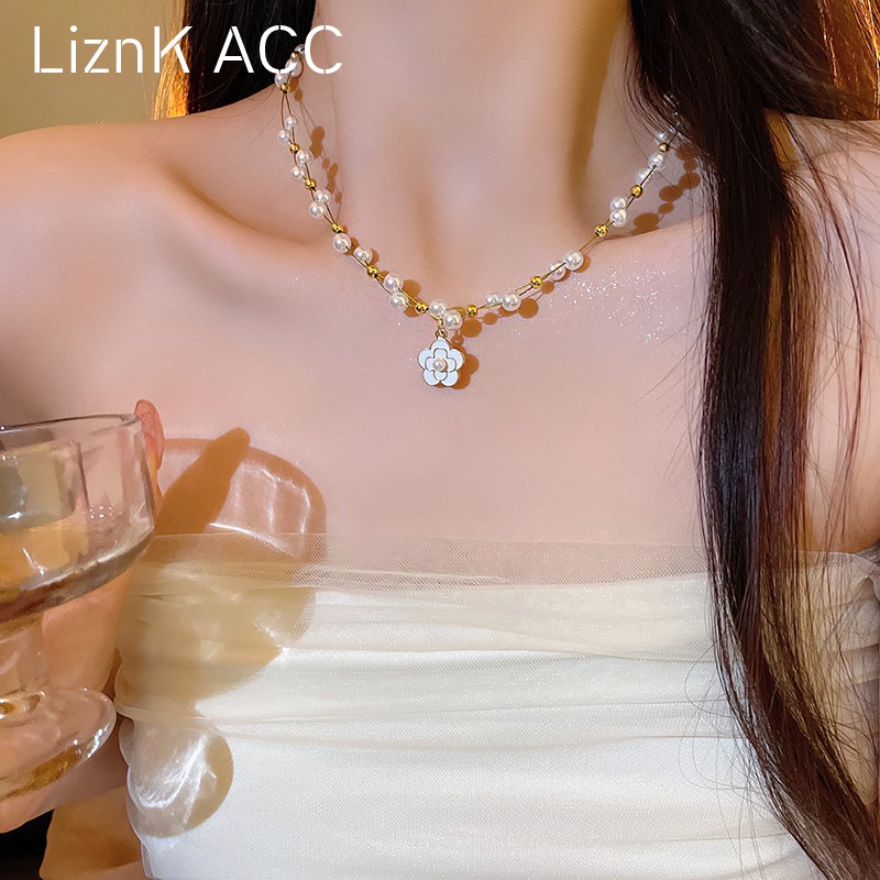 山茶花吊坠珍珠项链女2024新款爆款高级感锁骨链优雅法式复古颈链