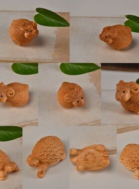 件雕刻金钱样柏木件动物乾坤牛