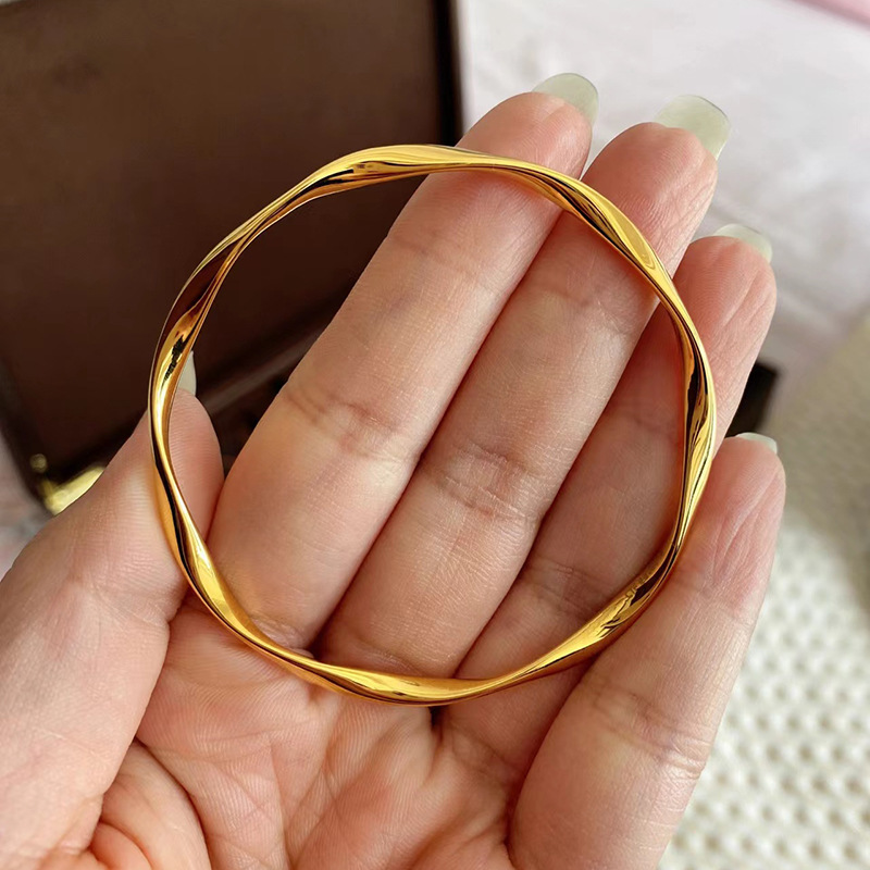 黄金色女莫比乌斯环手镯年轻款极简细手环时尚百搭不规则线条手圈
