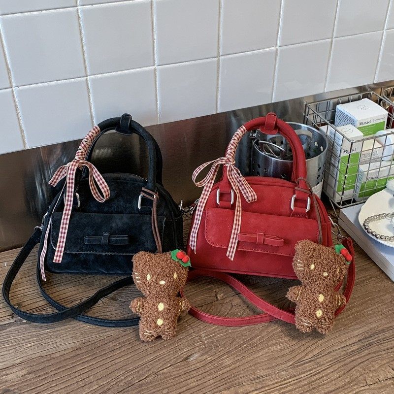 2025韩版潮小众蝴蝶结手提保龄球包包时尚简约通勤斜挎包女,箱包皮具/热销女包/男包,胸包,淘宝优惠券,粉丝福利购,淘宝优惠卷