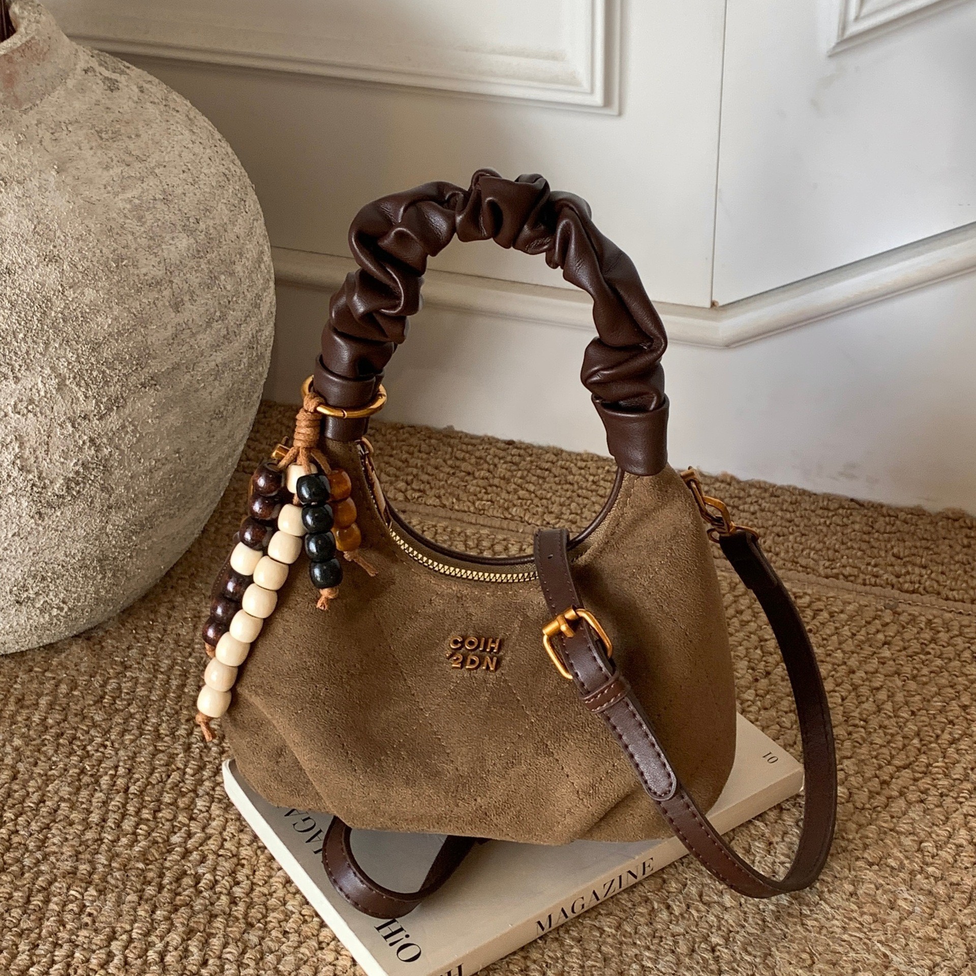 小众复古褶皱手提饺子包女